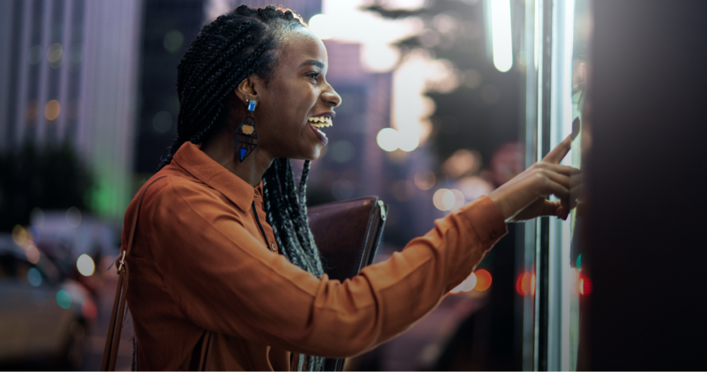 Woman interacting with a touchscreen display